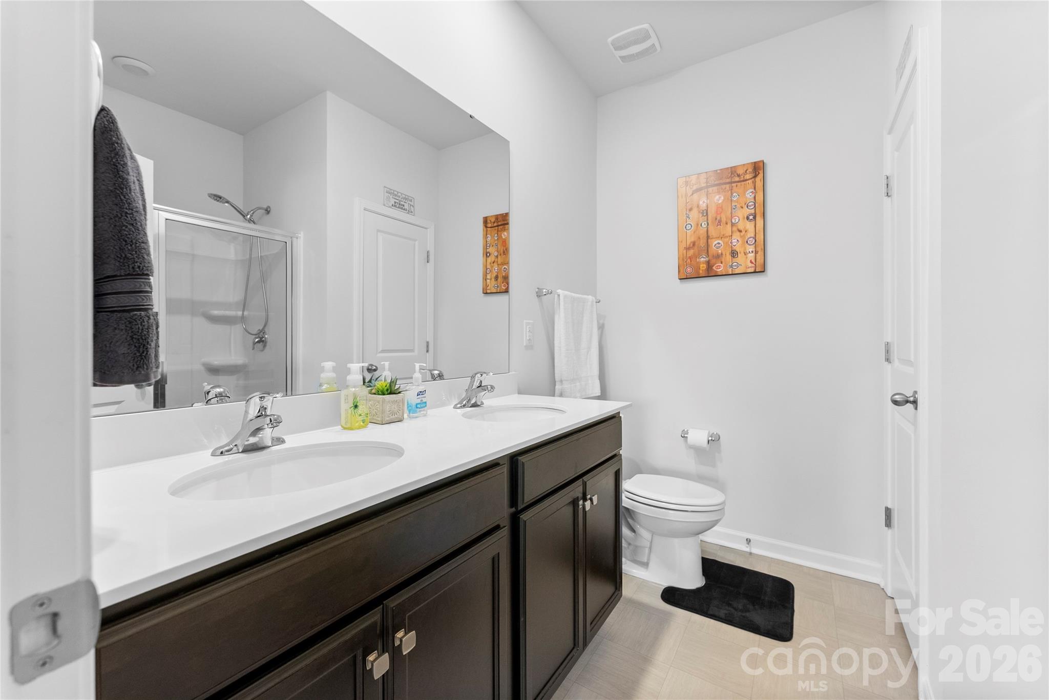 141 Amblers Knl Road Weaverville, NC 28787 - Photo 35 of 48 a bathroom with a sink toilet and a mirror