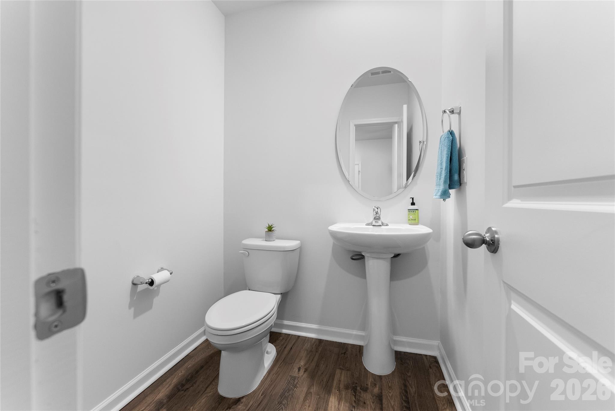 141 Amblers Knl Road Weaverville, NC 28787 - Photo 37 of 48 a bathroom with a toilet sink and mirror