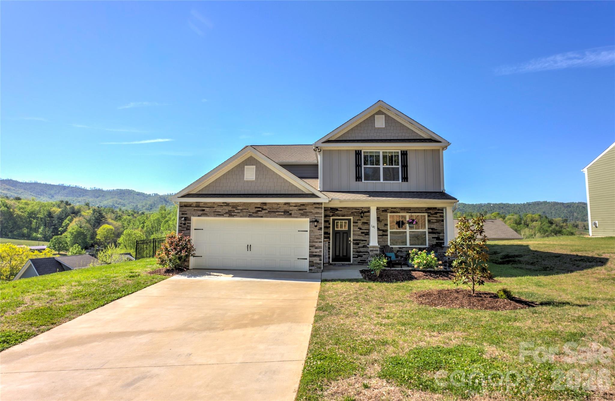 141 Amblers Knl Road Weaverville, NC 28787 - Photo 39 of 48 a front view of a house with a yard