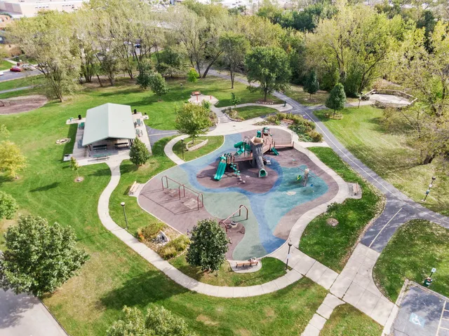 an aerial view of a house with outdoor space