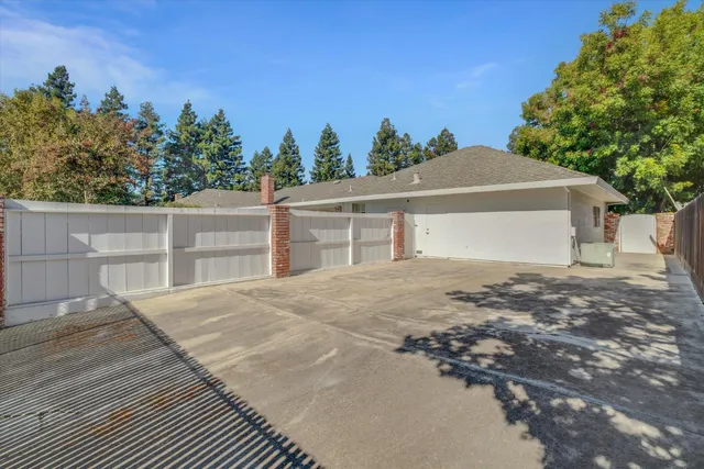 a view of a table and chairs in patio