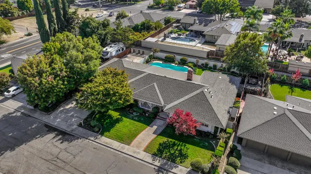 an aerial view of a house with a garden