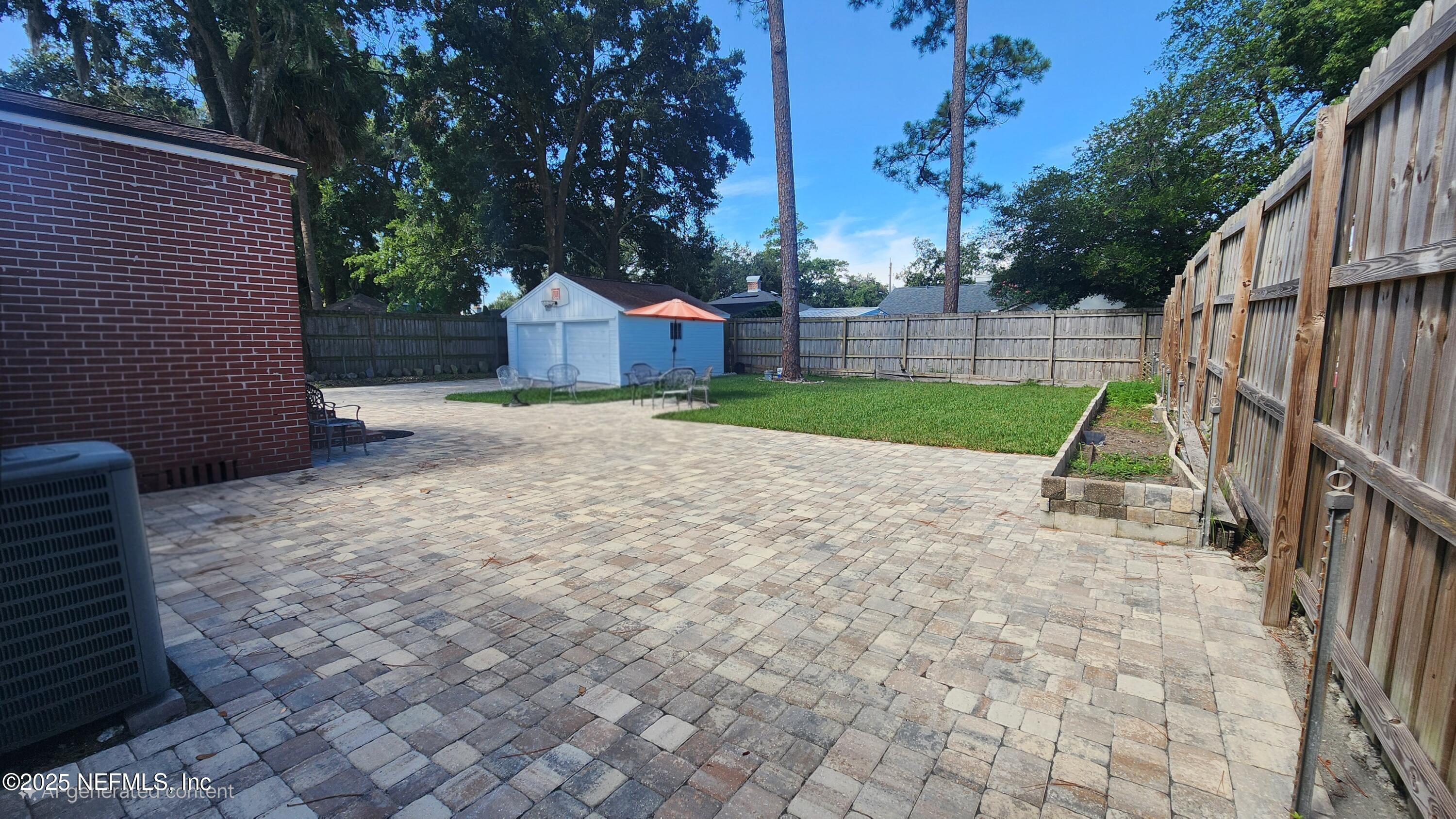 1418 Nicholson Road Jacksonville, FL 32207 - Photo 29 of 35 a view of backyard of house and deck