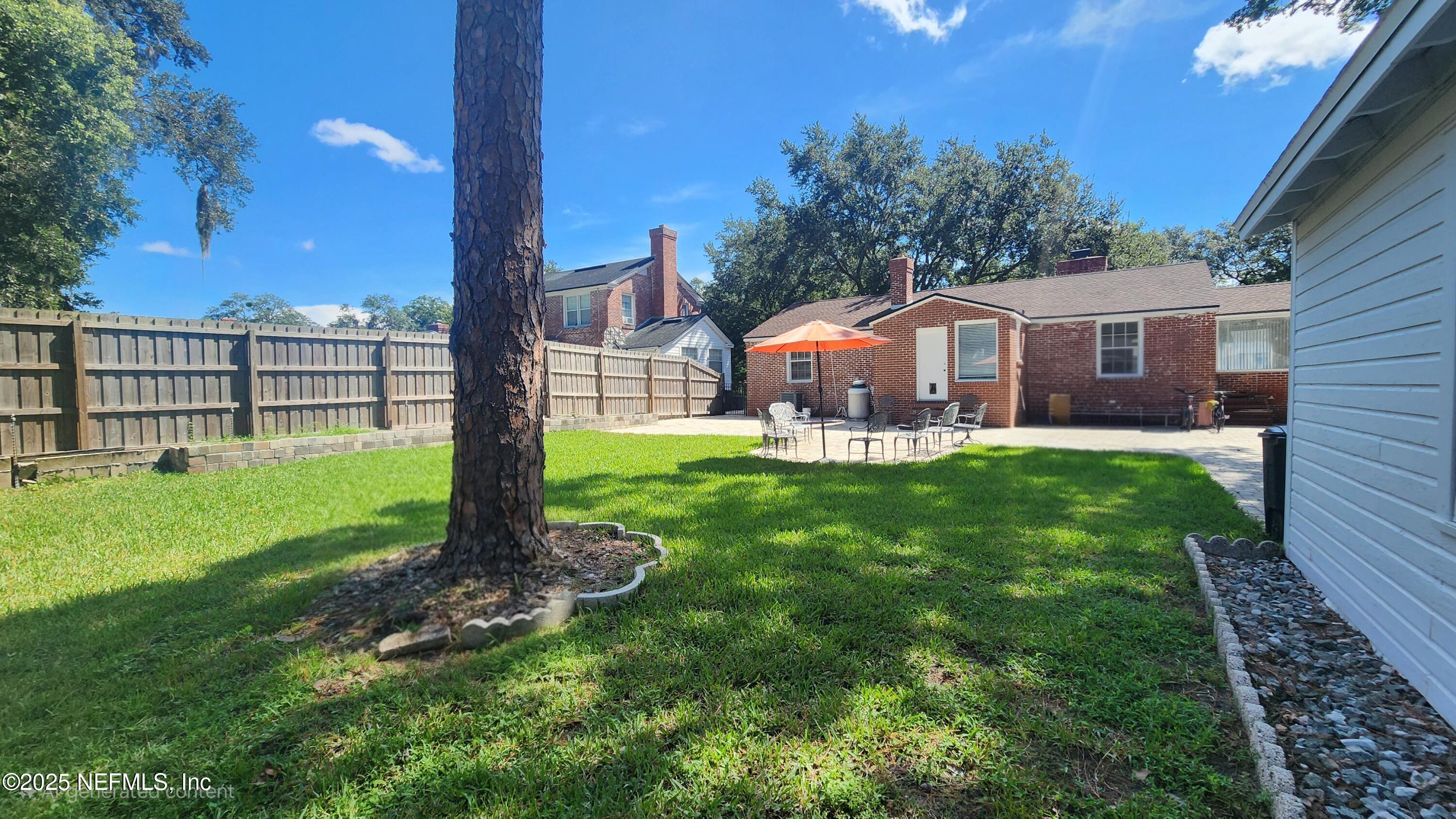 1418 Nicholson Road Jacksonville, FL 32207 - Photo 31 of 35 a front view of a house with garden