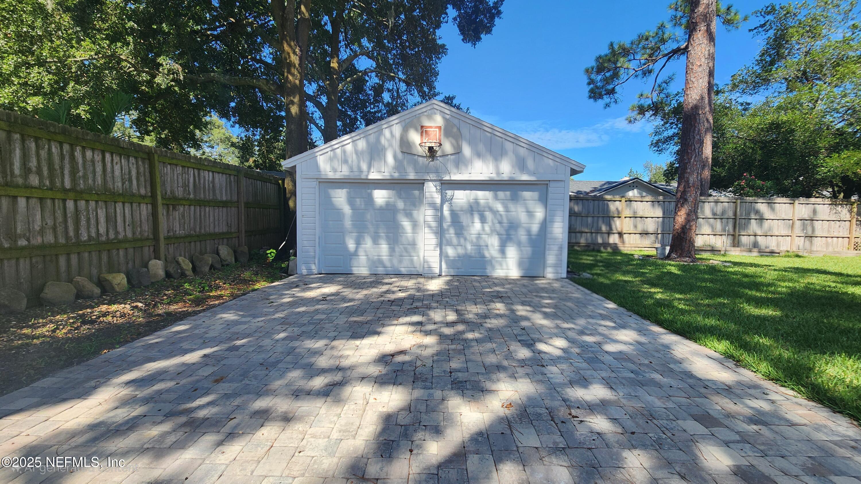 1418 Nicholson Road Jacksonville, FL 32207 - Photo 32 of 35 a view of a house with a yard