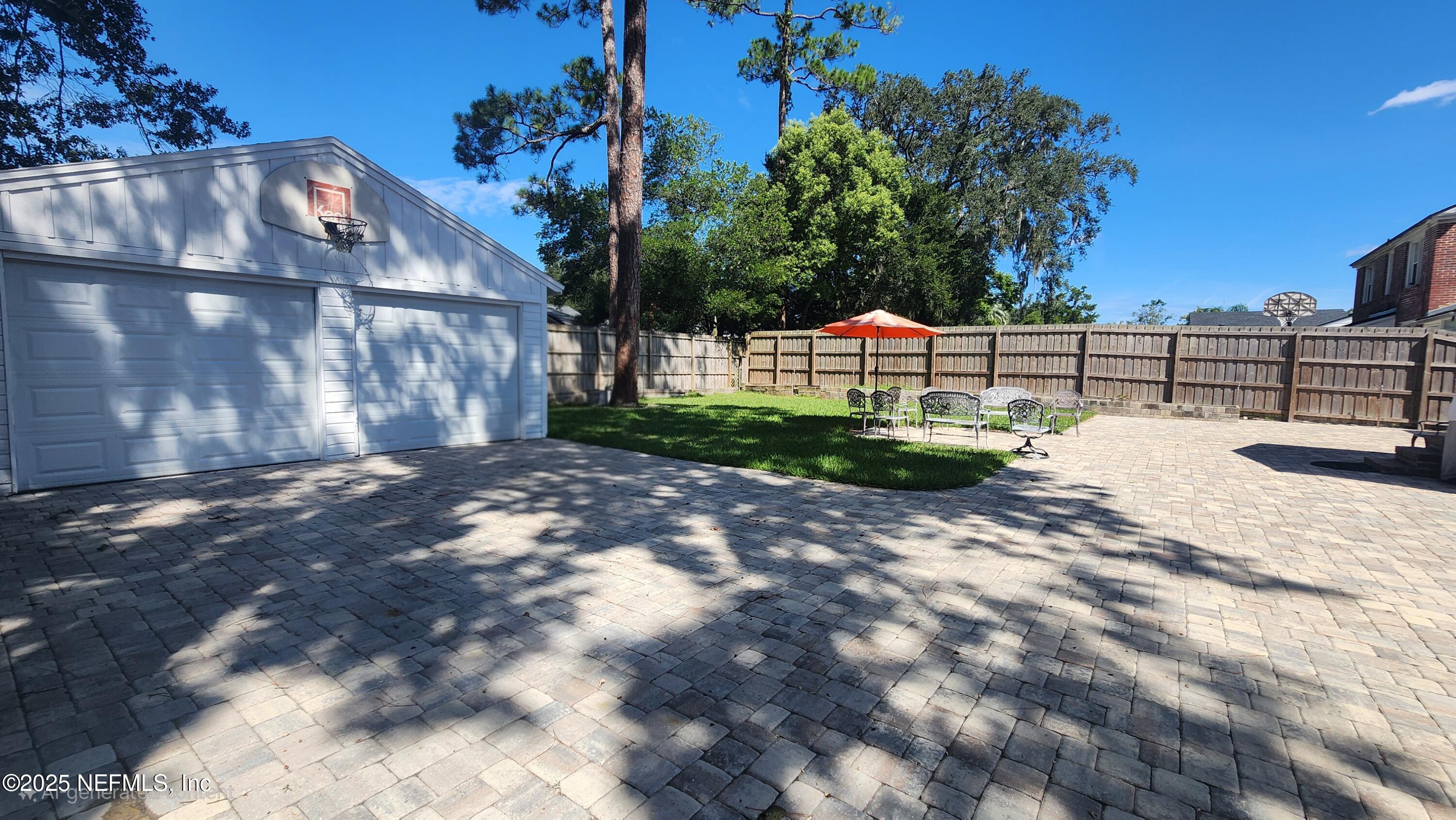 1418 Nicholson Road Jacksonville, FL 32207 - Photo 33 of 35 a street view with wooden fence