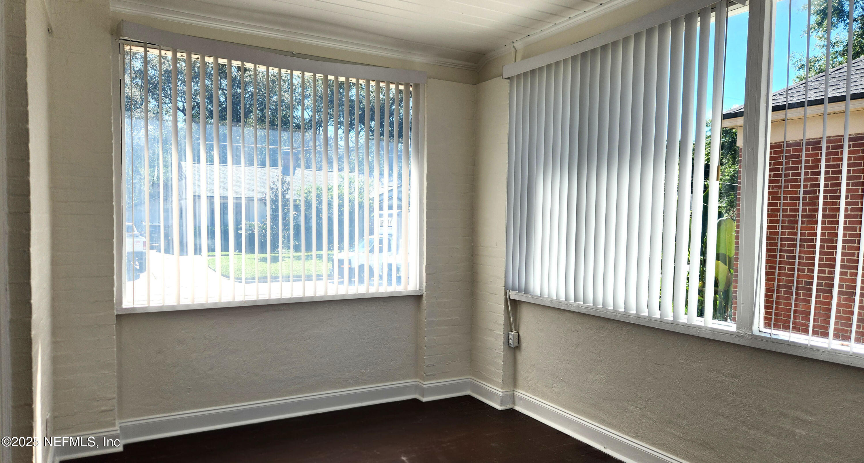 1418 Nicholson Road Jacksonville, FL 32207 - Photo 5 of 35 a view of an empty room with a window