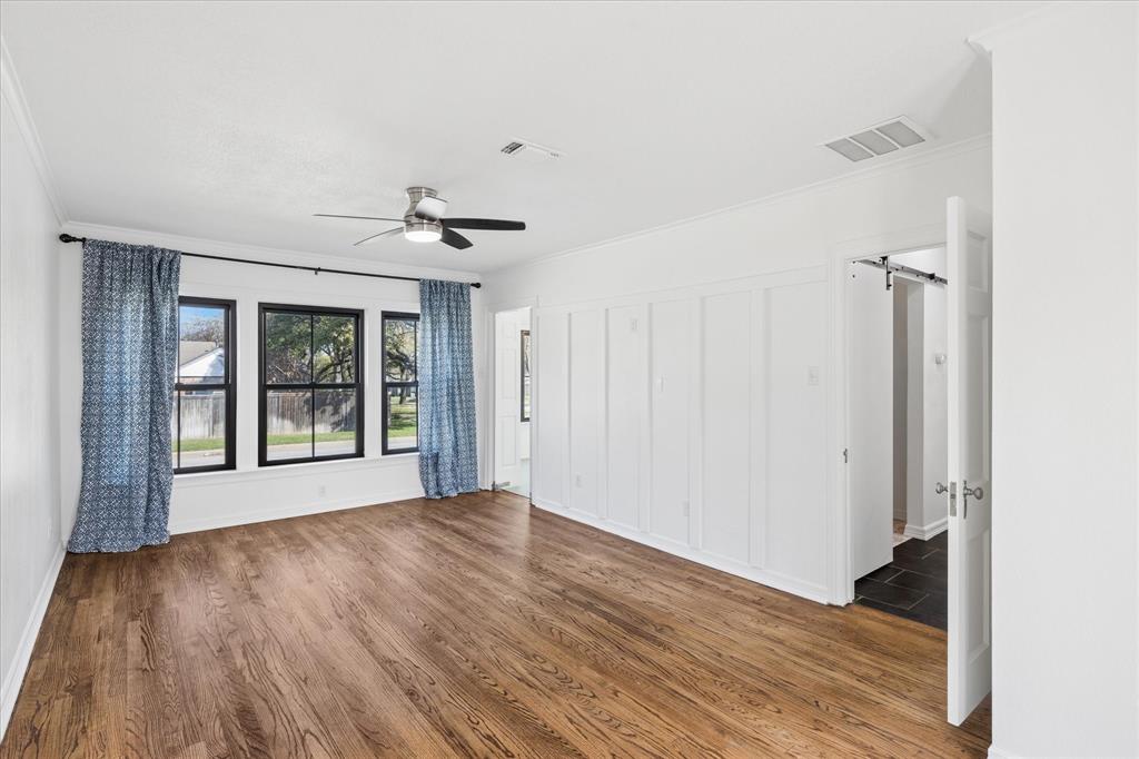 3600 Westcliff Road South Fort Worth, TX 76109 - Photo 15 of 38 a view of an empty room with wooden floor and a window