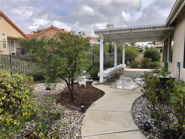 a view of a house with a garden