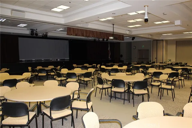 a group of people sitting in a room
