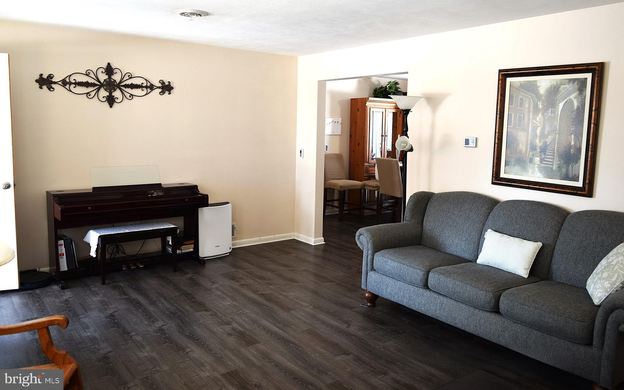 295 Bowman Road Hanover, PA 17331 - Photo 6 of 28 Living room with large opening to dining area