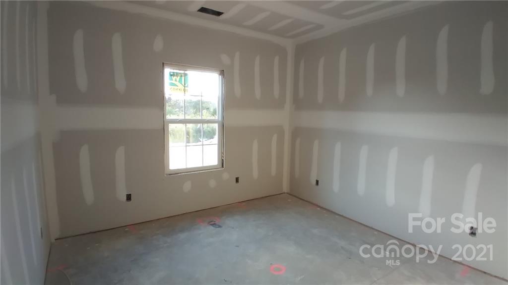 2135 State Rd S-46-1474, Unit 5 Clover, SC 29710 - Photo 7 of 18 a view of an empty room with a window