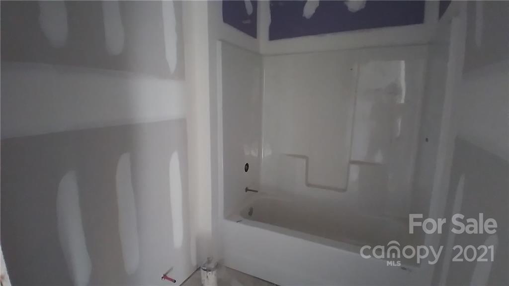 2135 State Rd S-46-1474, Unit 5 Clover, SC 29710 - Photo 9 of 18 a bathroom with a shower