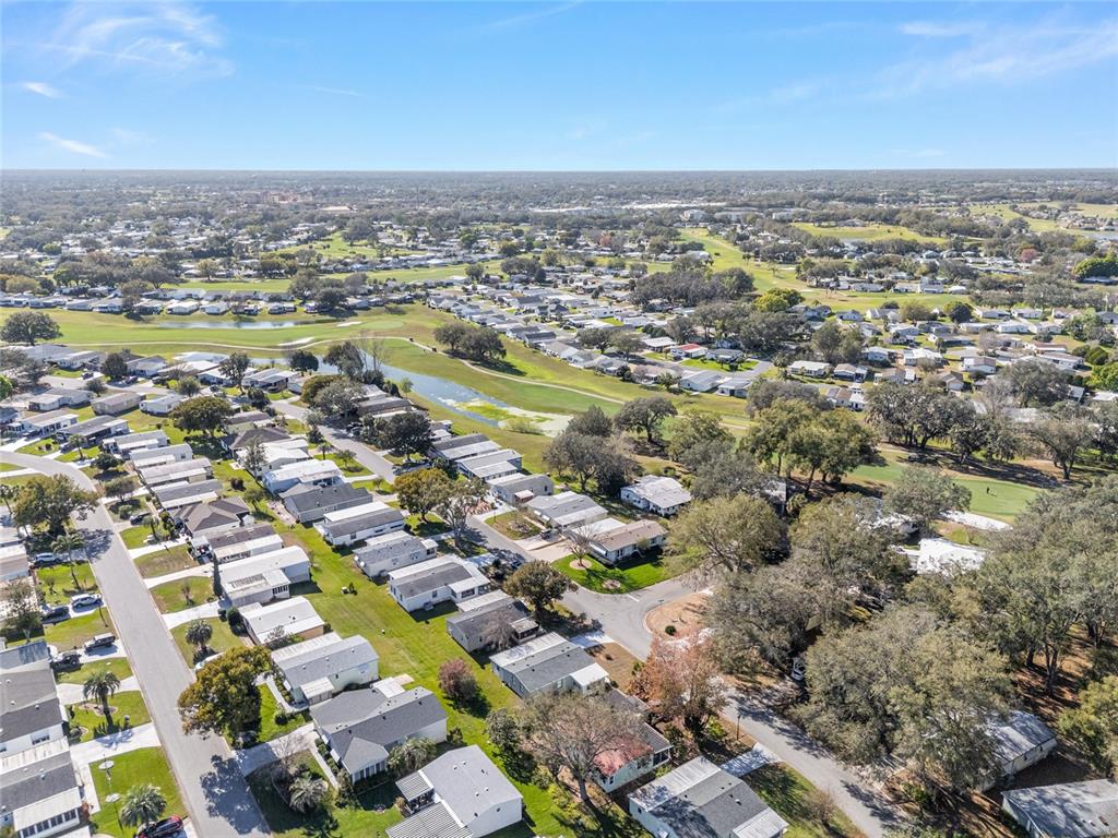 1727 Hilton Head Boulevard Lady Lake, FL 32159 - Photo 39 of 39 an aerial view of residential houses with outdoor space