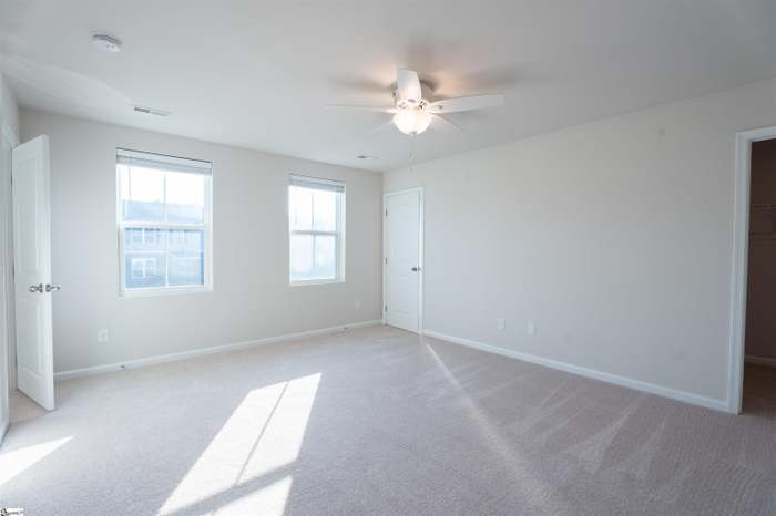 156 Queens Mill Court Pendleton, SC 29670 - Photo 12 of 18 This airy bedroom offers a comfortable retreat with ample natural light.