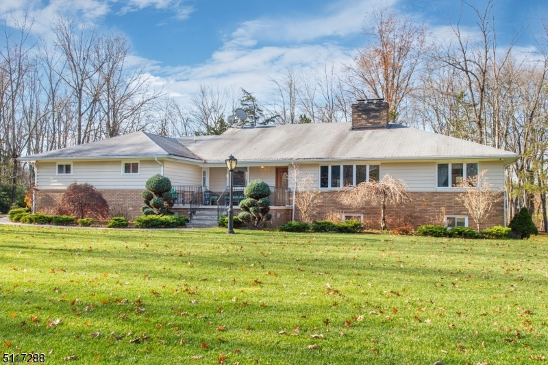 5 Spring Lane Warren, NJ 07059 - Photo 1 of 31 a front view of a house with a garden