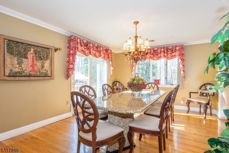 5 Spring Lane Warren, NJ 07059 - Photo 11 of 31 a view of a dining room with furniture window and wooden floor