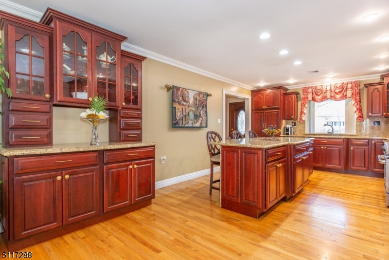5 Spring Lane Warren, NJ 07059 - Photo 14 of 31 a kitchen with stainless steel appliances granite countertop a stove a sink and a refrigerator