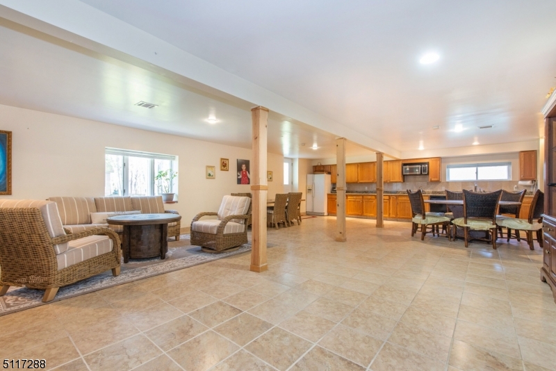 5 Spring Lane Warren, NJ 07059 - Photo 24 of 31 a living room with furniture and a table