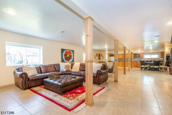 a living room with furniture and a table