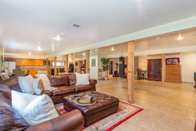 5 Spring Lane Warren, NJ 07059 - Photo 26 of 31 a living room with furniture and a table