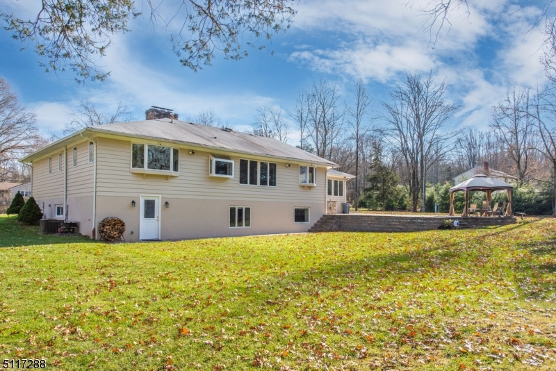 5 Spring Lane Warren, NJ 07059 - Photo 30 of 31 a view of a house with a yard