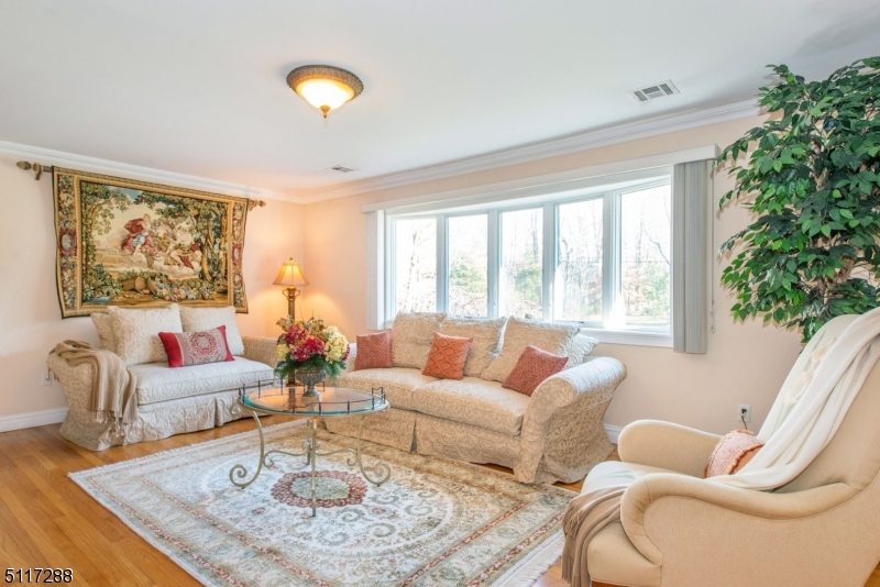5 Spring Lane Warren, NJ 07059 - Photo 3 of 31 a living room with furniture and a large window
