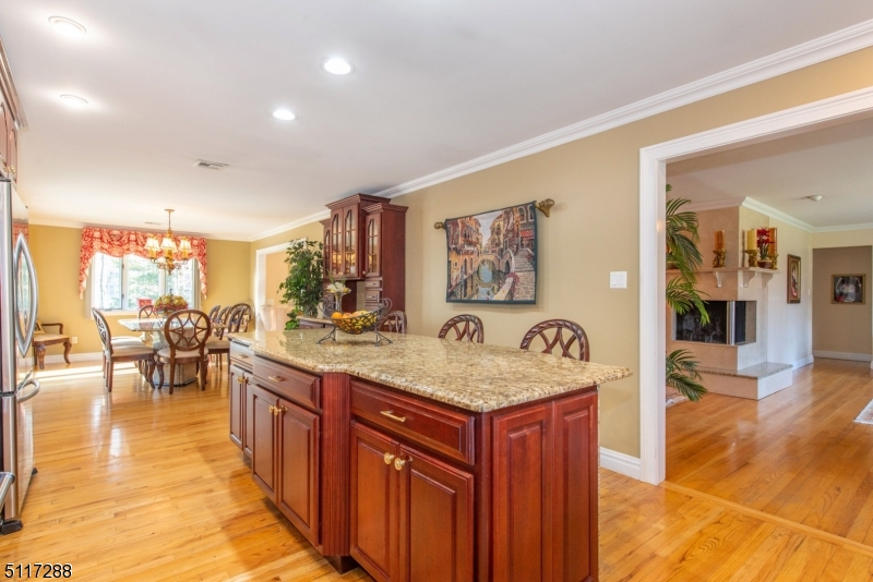 5 Spring Lane Warren, NJ 07059 - Photo 7 of 31 a hallway with table and chairs