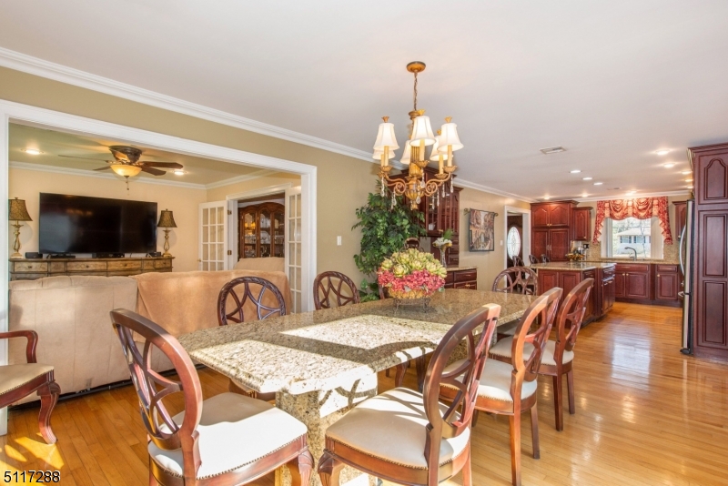 5 Spring Lane Warren, NJ 07059 - Photo 9 of 31 a view of a dining room with furniture and wooden floor