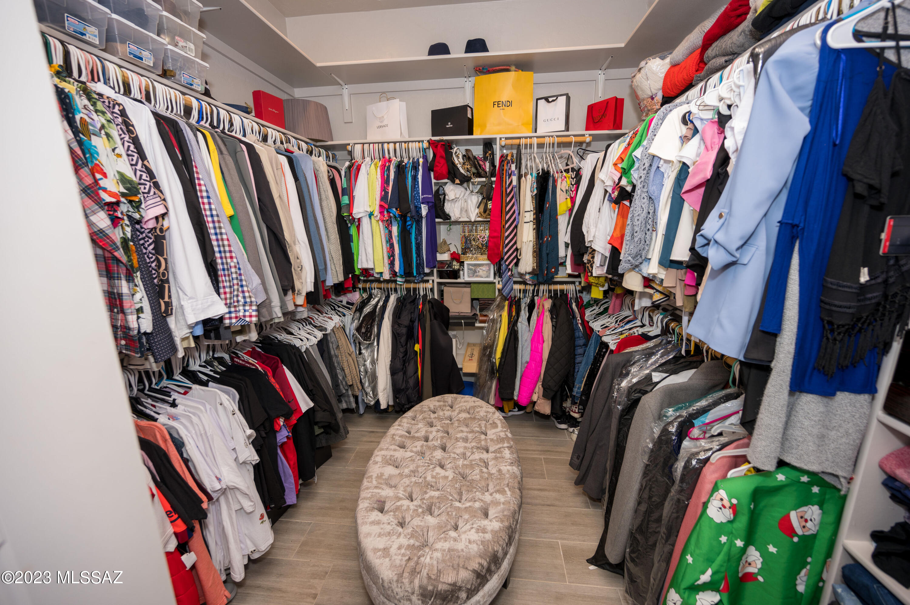 384 Via Estrella Vista Rio Rico, AZ 85648 - Photo 12 of 32 a view of walk in closet with clothes