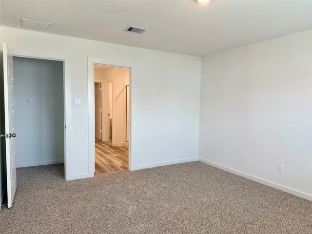an empty room with closet