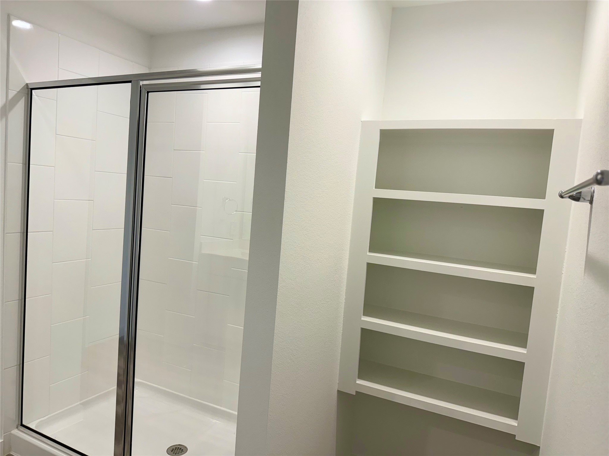 2911 Needham Gdn Lane Houston, TX 77051 - Photo 23 of 50 a view of walk in closet with empty racks