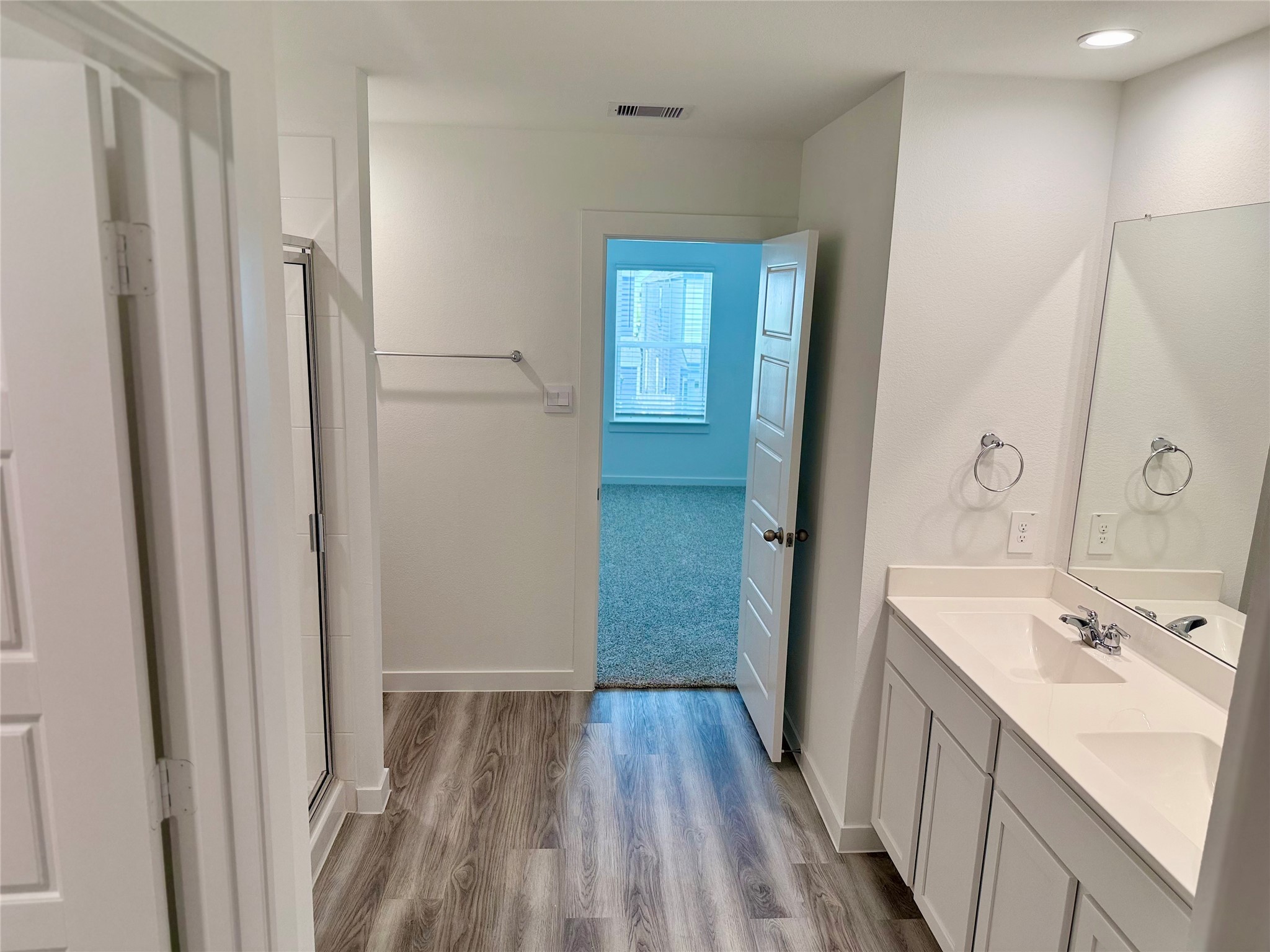 2911 Needham Gdn Lane Houston, TX 77051 - Photo 24 of 50 a bathroom with a sink a mirror and a shower