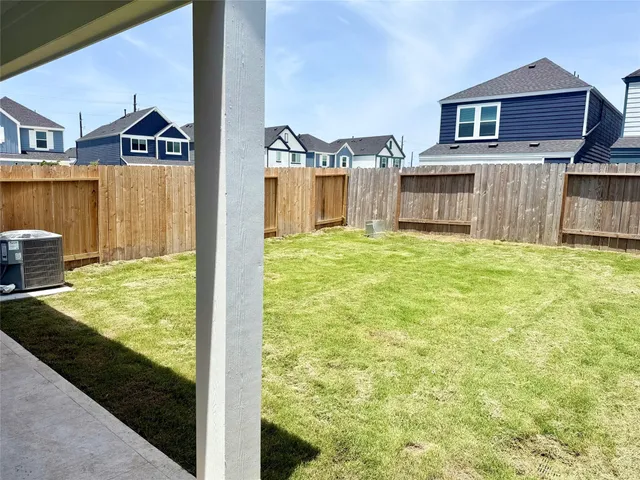 a view of an apartment with a swimming pool