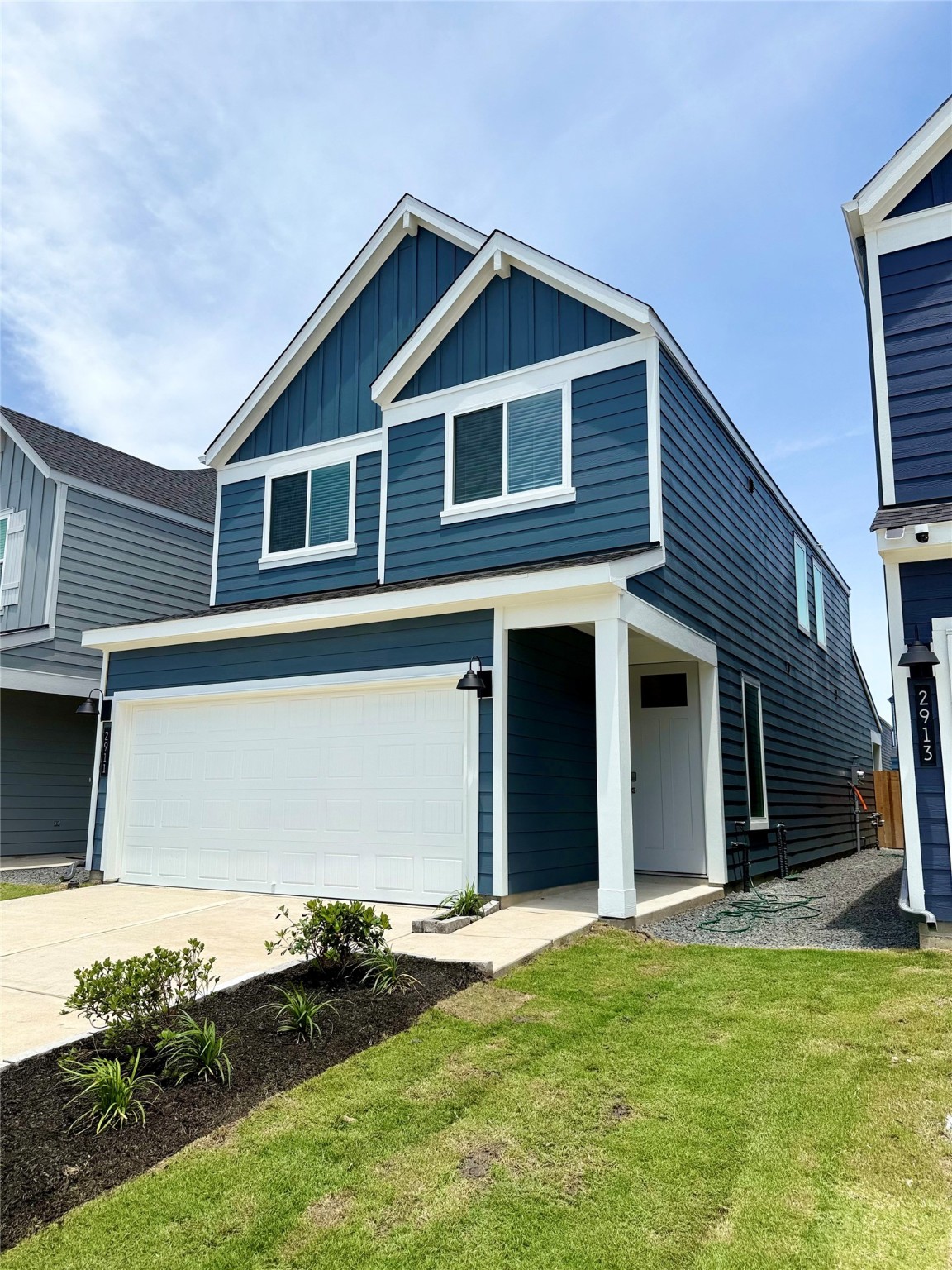2911 Needham Gdn Lane Houston, TX 77051 - Photo 4 of 50 a front view of a house with a yard
