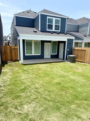 a front view of a building with a swimming pool