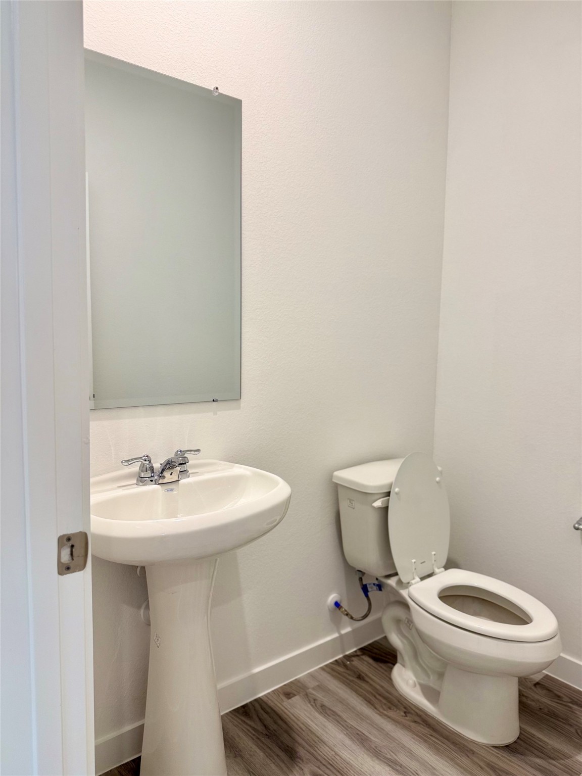 2911 Needham Gdn Lane Houston, TX 77051 - Photo 45 of 50 a bathroom with a sink toilet and a mirror