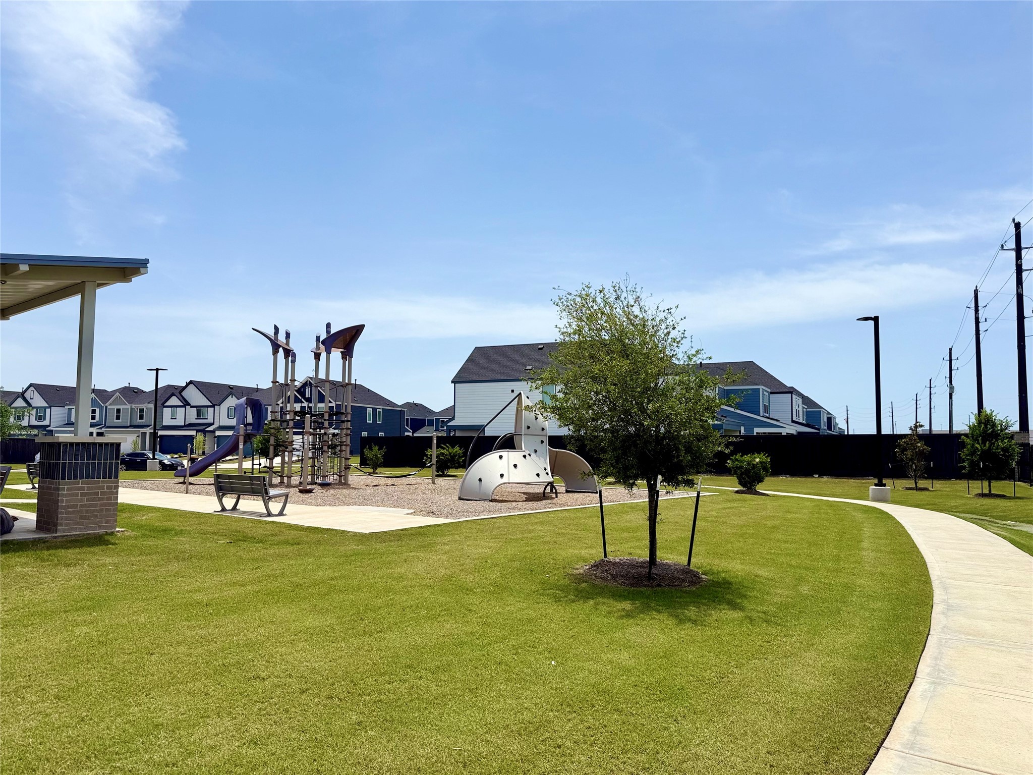 2911 Needham Gdn Lane Houston, TX 77051 - Photo 48 of 50 a view of a swimming pool with a table and chairs