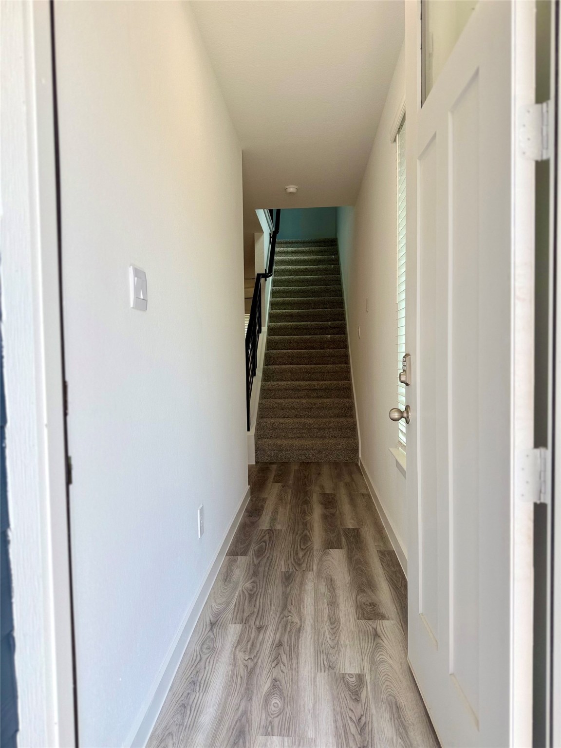 2911 Needham Gdn Lane Houston, TX 77051 - Photo 5 of 50 a view of a hallway with wooden floor and entryway