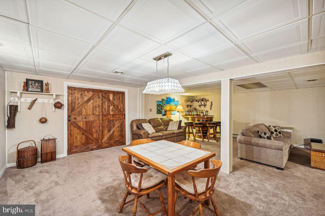 2214 Seneca Road Essex, MD 21221 - Photo 35 of 40 Lower level rec room
