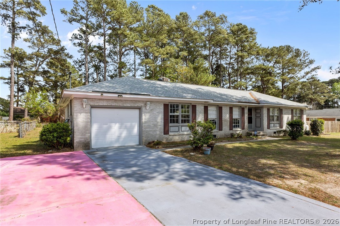 908 Ruton Court Fayetteville, NC 28303 - Photo 3 of 29 a front view of a house with a yard and porch