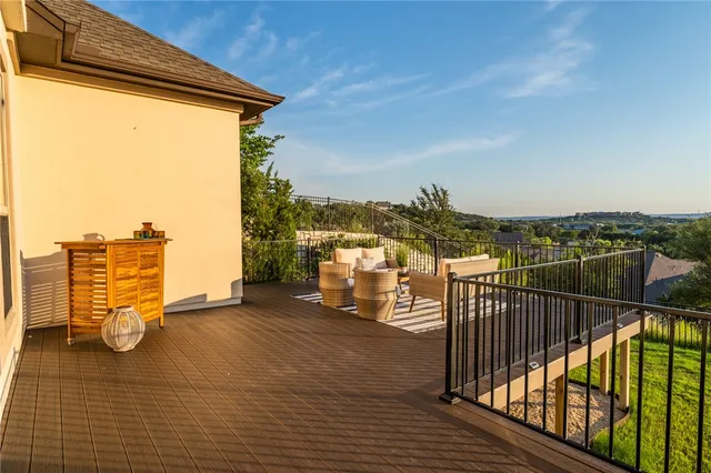 a view of a balcony with city view