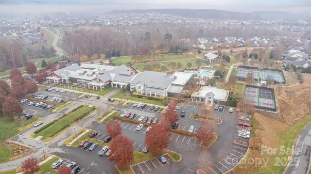 an aerial view of a city with lots of residential buildings