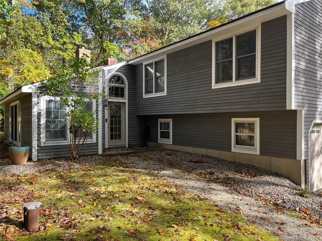 114 Squires Road Madison, CT 06443 - Photo 1 of 1 a view of a house with a yard