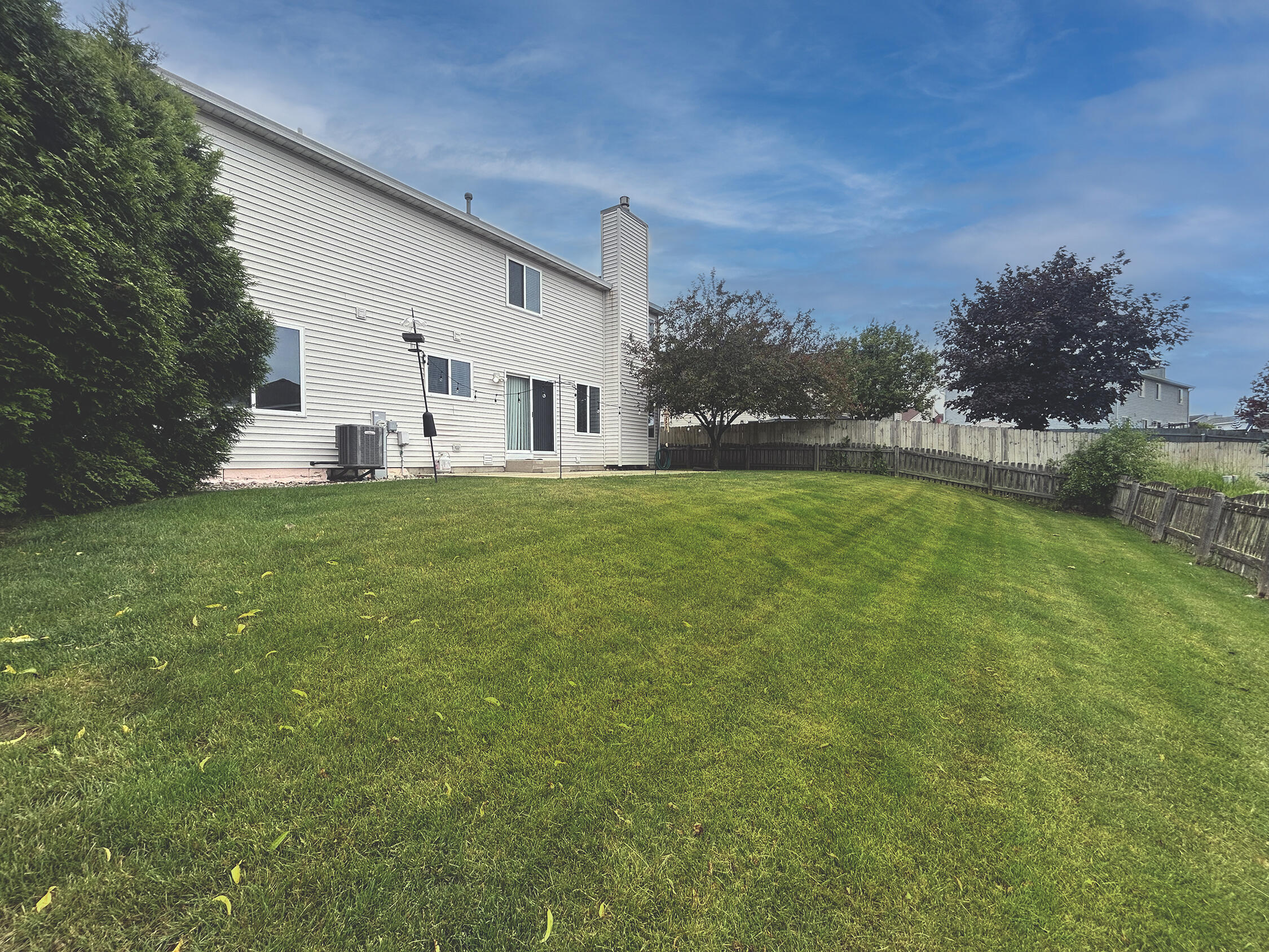9704 67th Street Kenosha, WI 53142 - Photo 23 of 27 Backyard full view from corner_IMG_9144