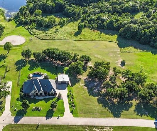 1387 Shadow Lakes Drive Wills Point, TX 75169 - Photo 2 of 33 a view of a lake with a yard