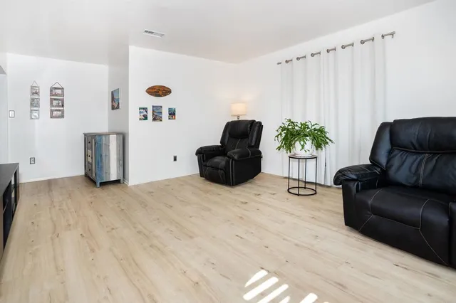 a living room with furniture and a couch