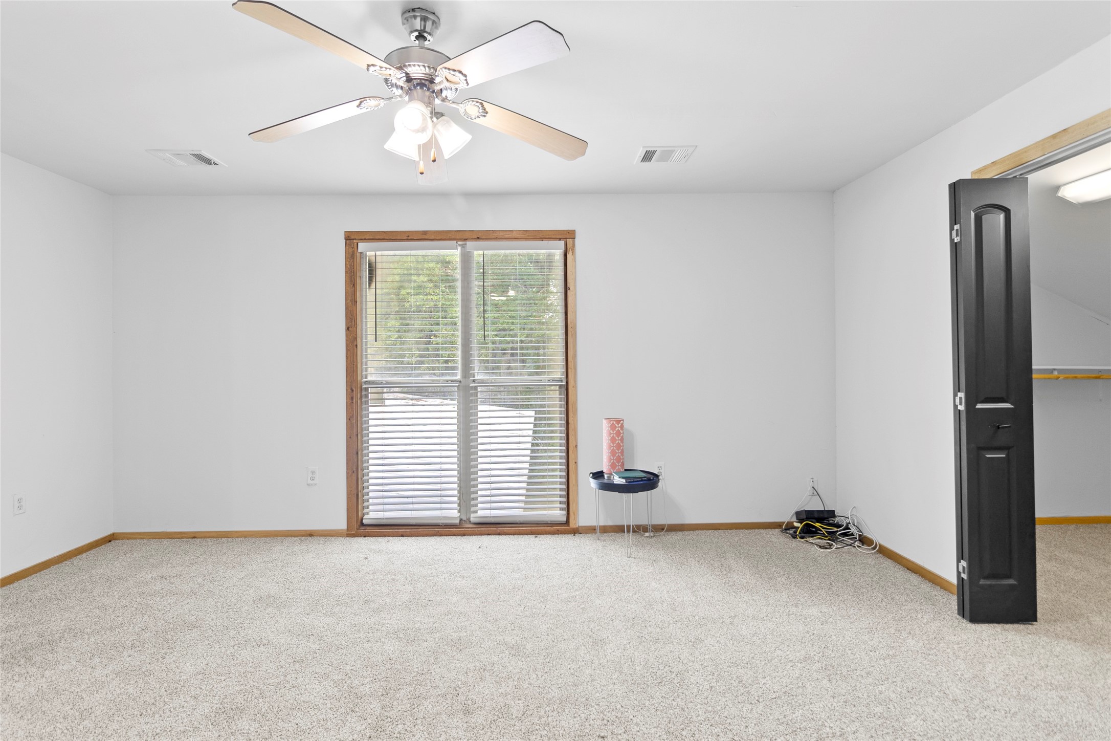553 County Road 370 Splendora, TX 77372 - Photo 15 of 41 a view of an empty room with a window