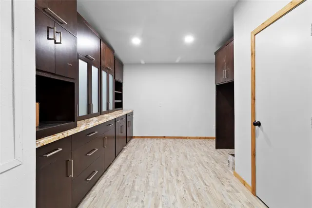 a bathroom with a sink and a large mirror