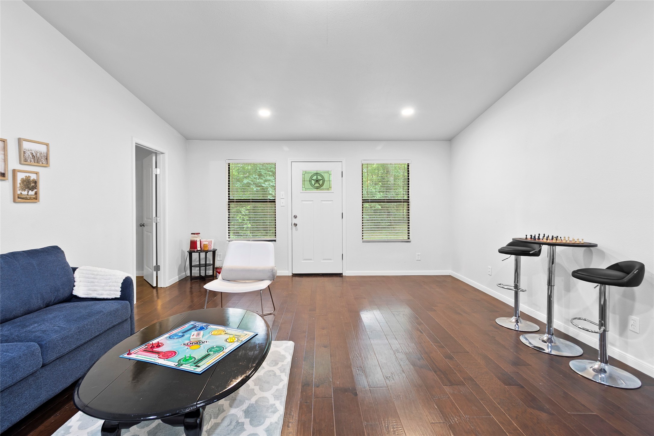 553 County Road 370 Splendora, TX 77372 - Photo 24 of 41 a living room with furniture and a wooden floor